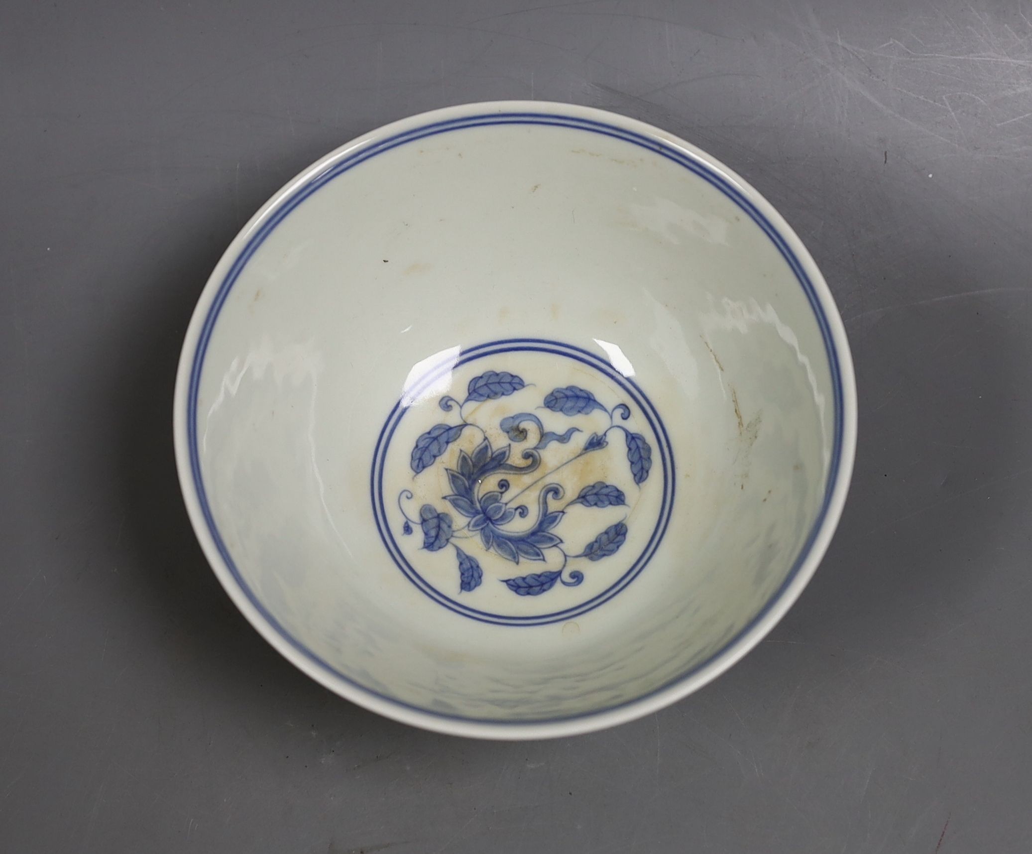 A Chinese blue and white bowl, 14 cms diameter.